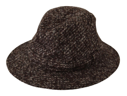 Accented with a matching tweed ribbon for a touch of grandeur