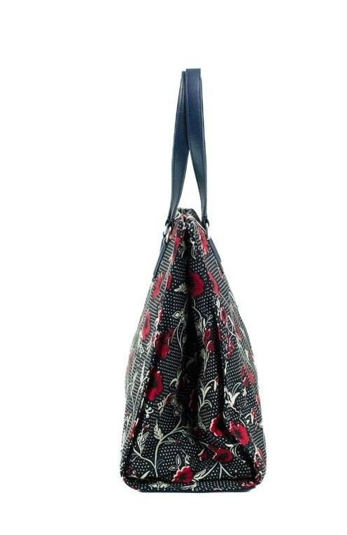Handbag featuring inner zip and slip pockets, magnetic closure, and lightweight design