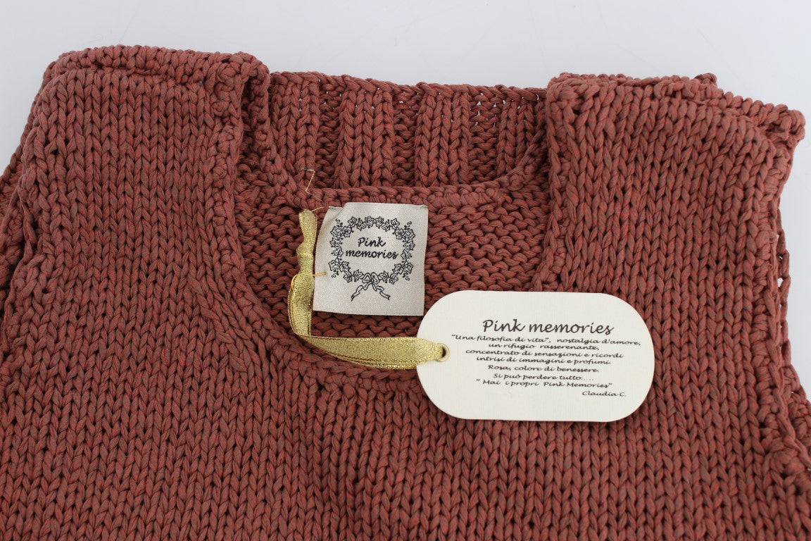 Indulge in sophistication with this chic red sleeveless knit vest sweater