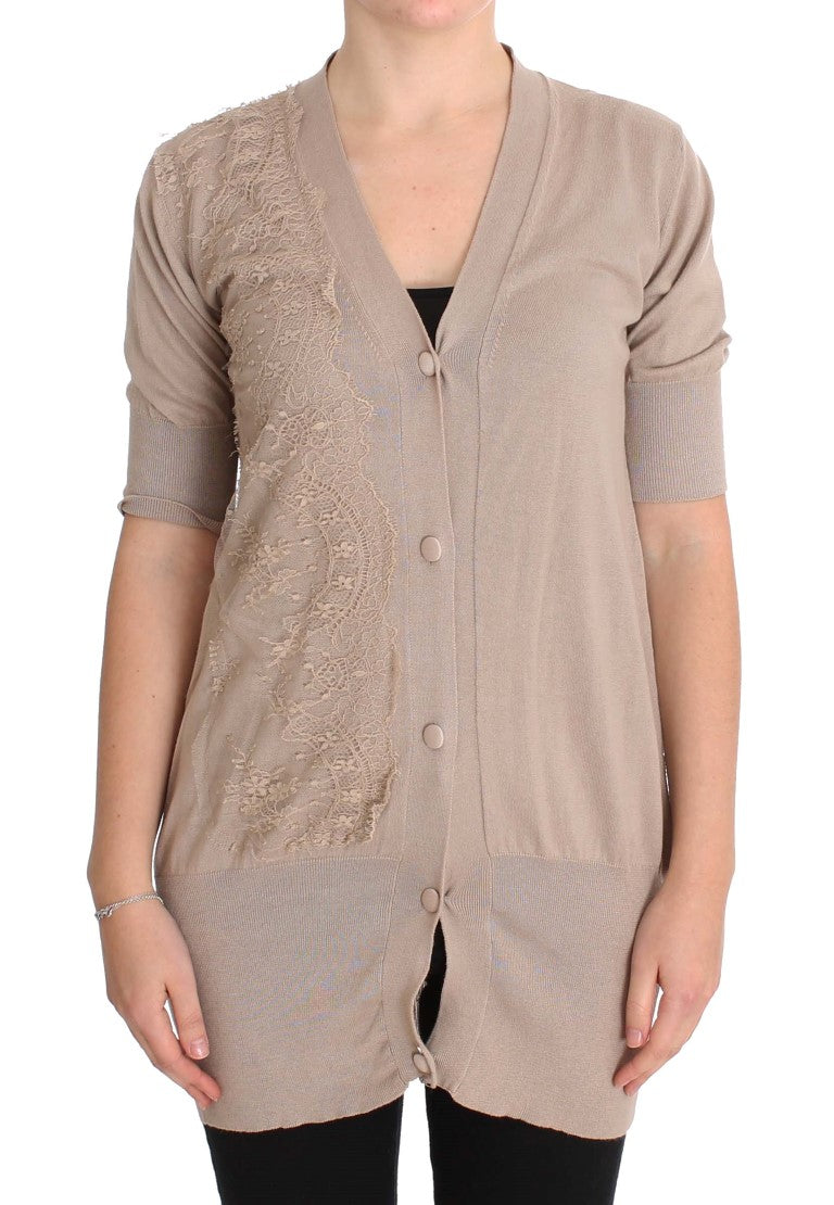Embrace feminine elegance with this stunning PINK MEMORIES cardigan sweater