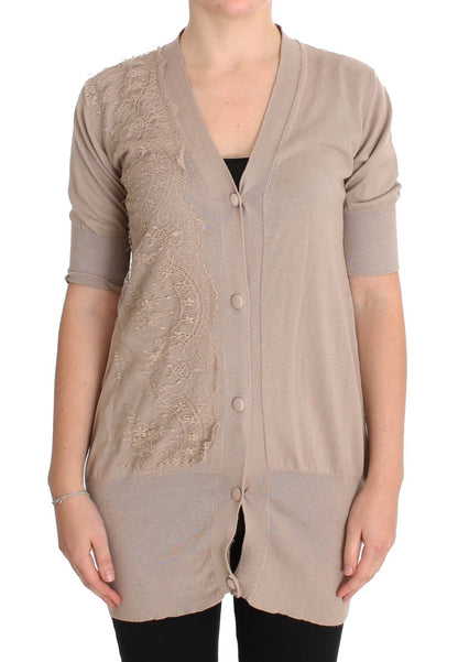 Embrace feminine elegance with this stunning PINK MEMORIES cardigan sweater