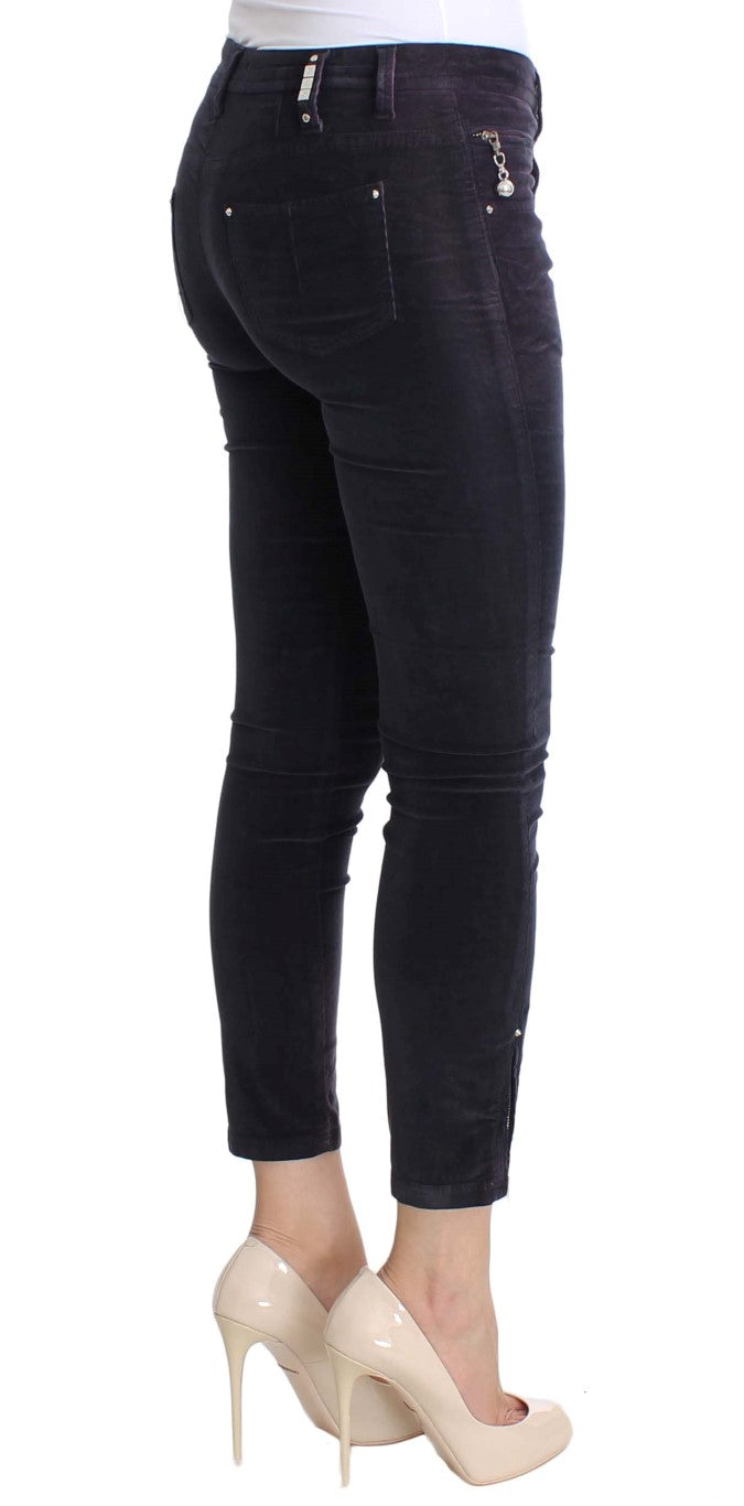 Features zipper fly, front and back pockets, and logo details