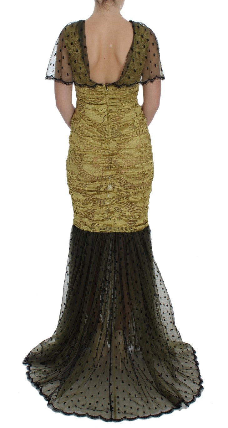 Elegant Dolce & Gabbana sheath dress adorned with graceful yellow and black floral lace pattern