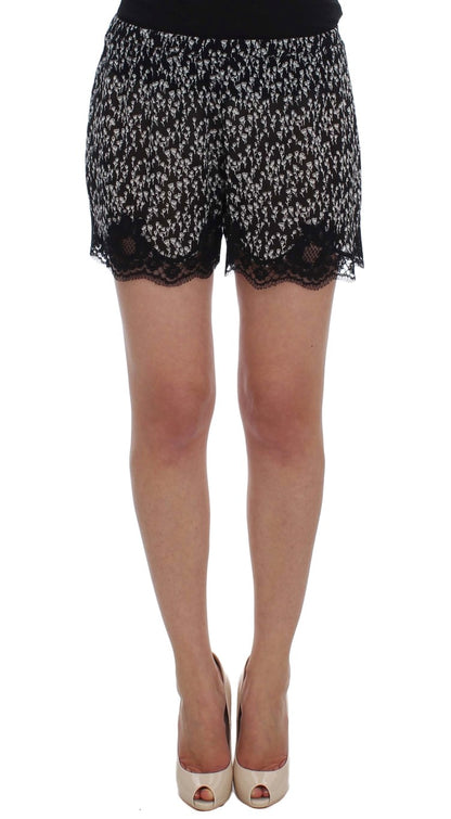 Dolce & Gabbana Elegant Black & White Floral Lace Silk Shorts expertly crafted in Italy