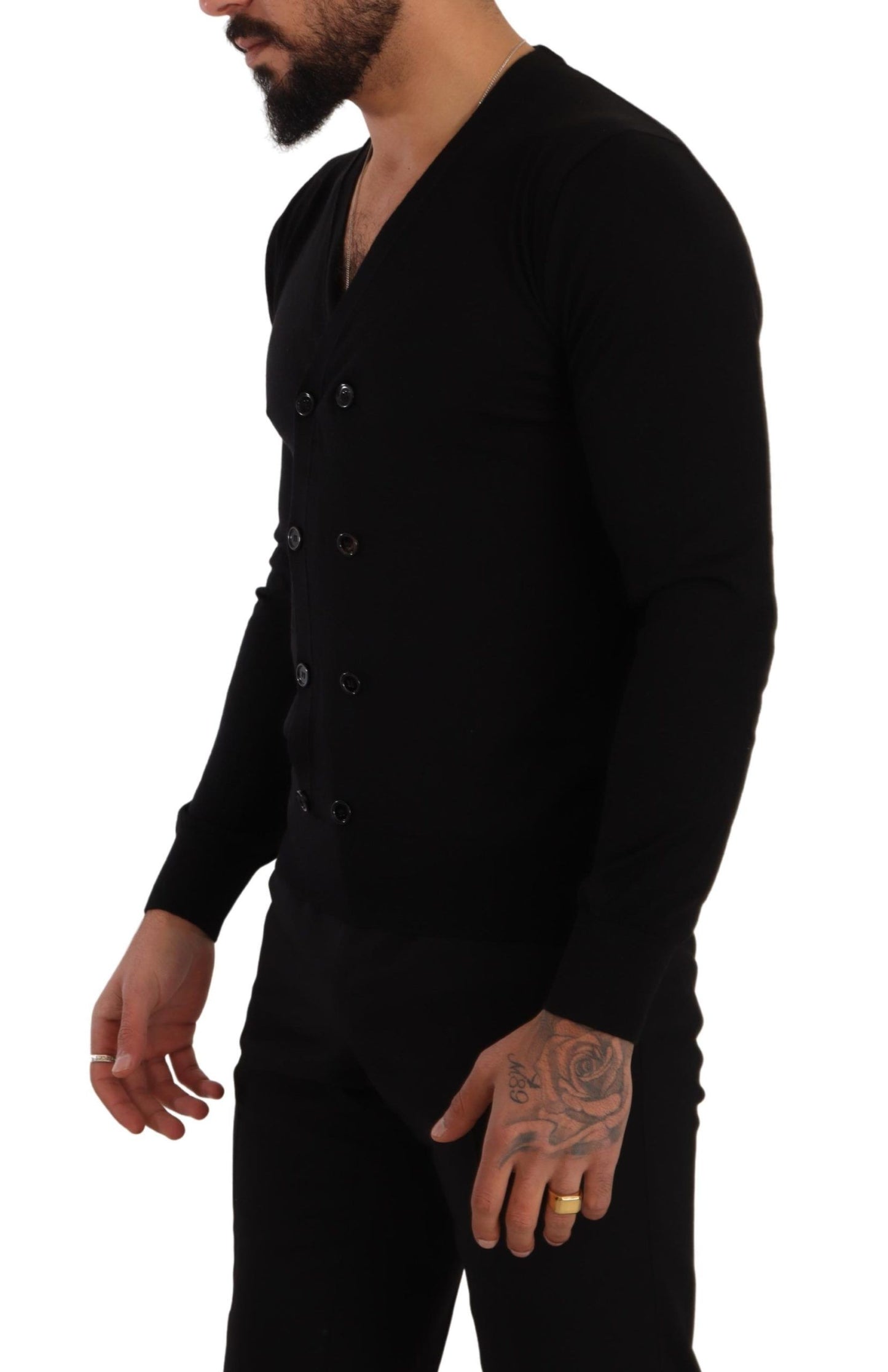Classic elegance exudes from the V-neckline and ribbed knit waistband and cuffs