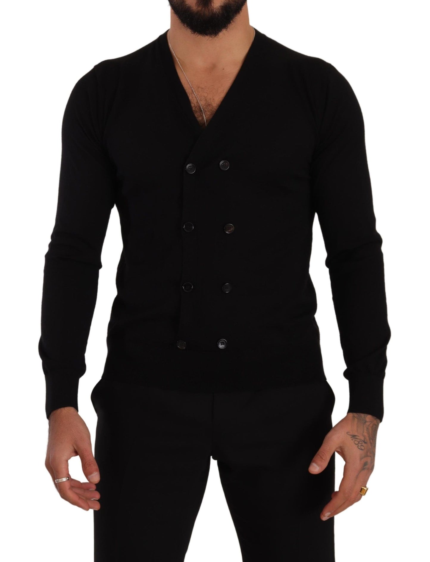 Dolce & Gabbana Elegant V-Neck Black Cashmere Cardigan sweater drapes over frame in luxurious black cashmere fabric