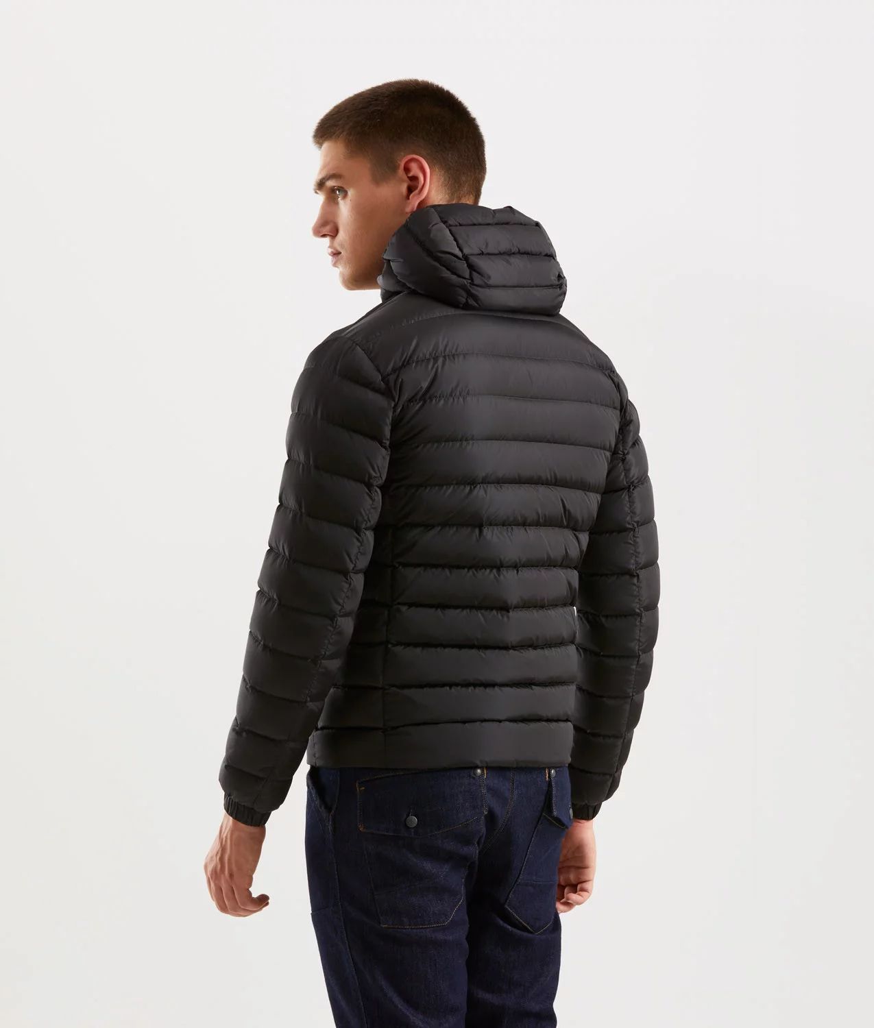 Men's black down jacket with functional chest pocket for essentials