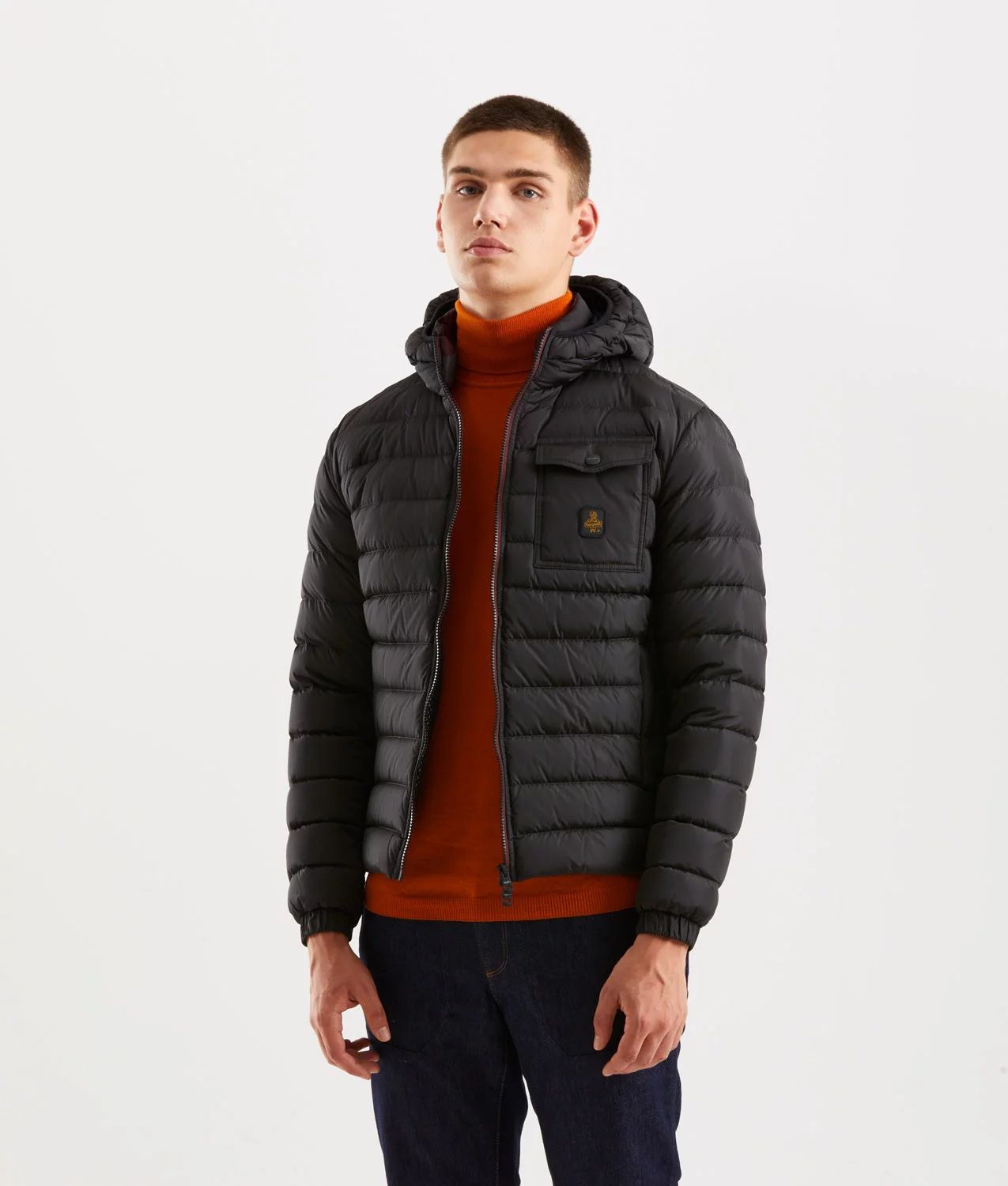 Utility-focused black down jacket with secure zip closure and hood