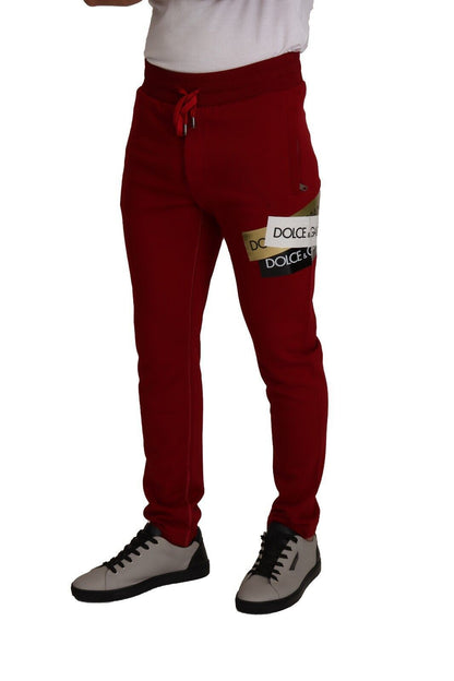 Dolce & Gabbana red jogging pants, a stylish and durable addition from Italy