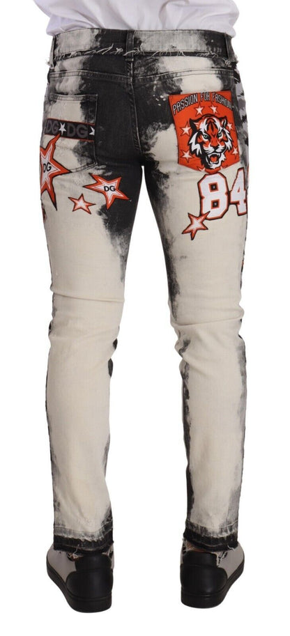 Slim fit distressed denim jeans with iconic logo detailing