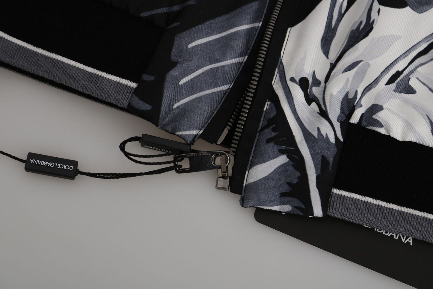 100% Silk lining and two front pockets and two inside pockets