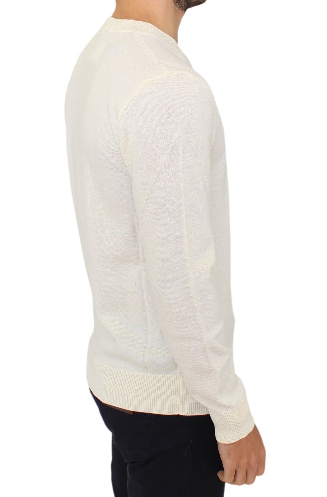  Features a sleek V-neck design and subtle logo details 