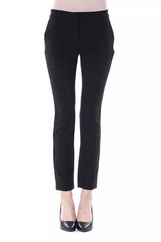 Black polyester women pants with lateral zip closure and frontal application