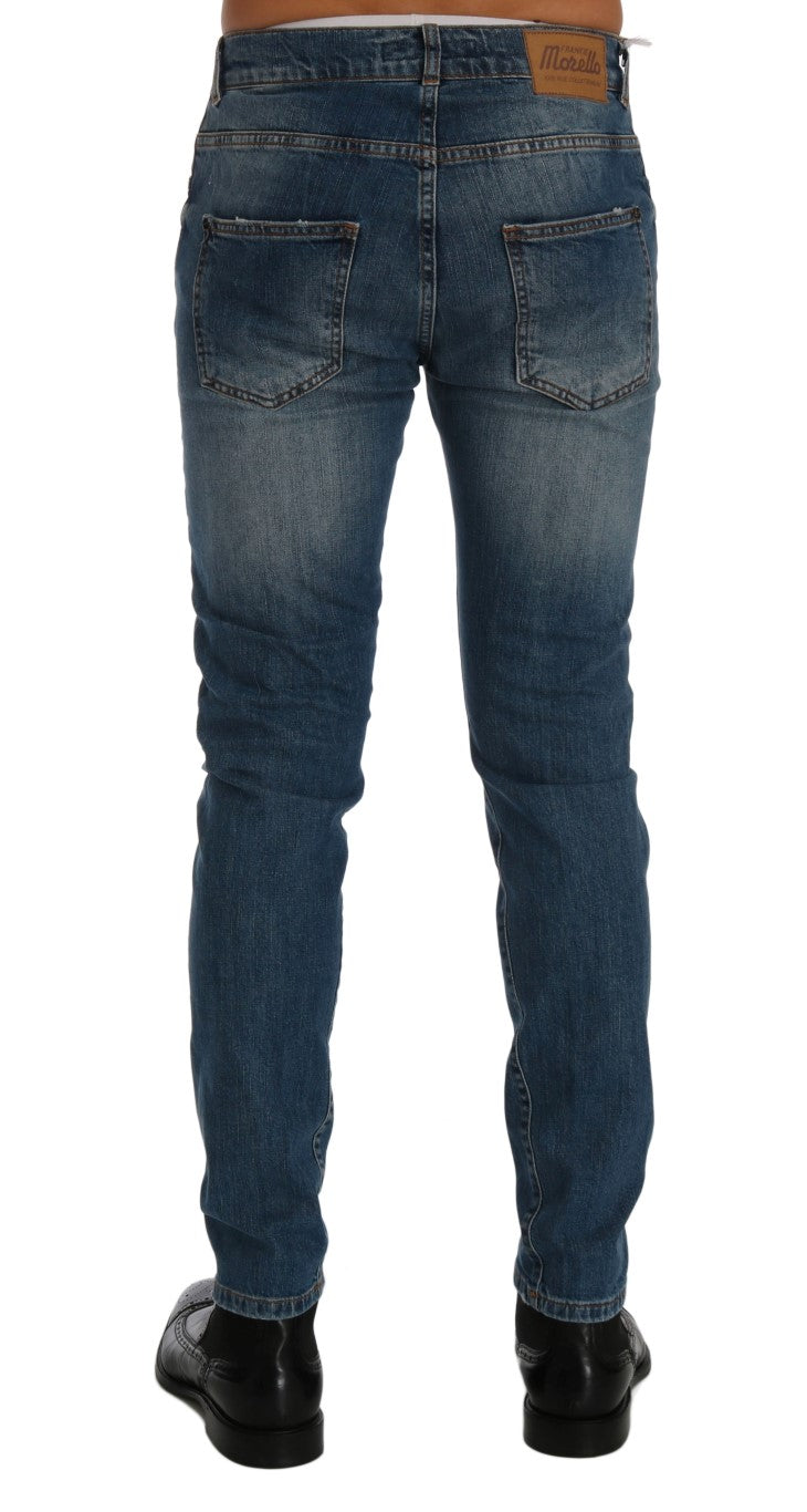 Stylish blue wash jeans with classic button-fly closure and logo details