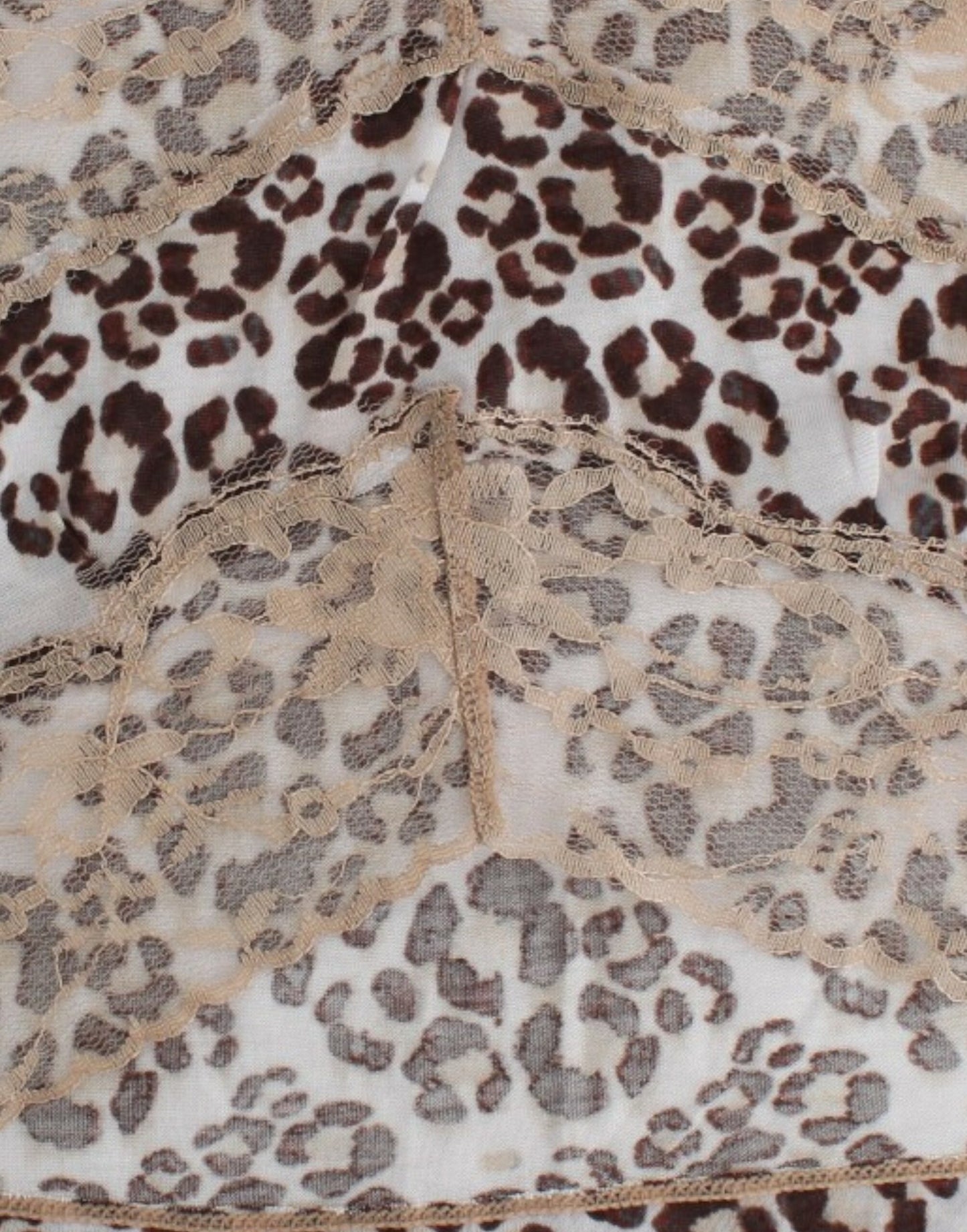 Indulge in the essence of sophistication with this gorgeous top