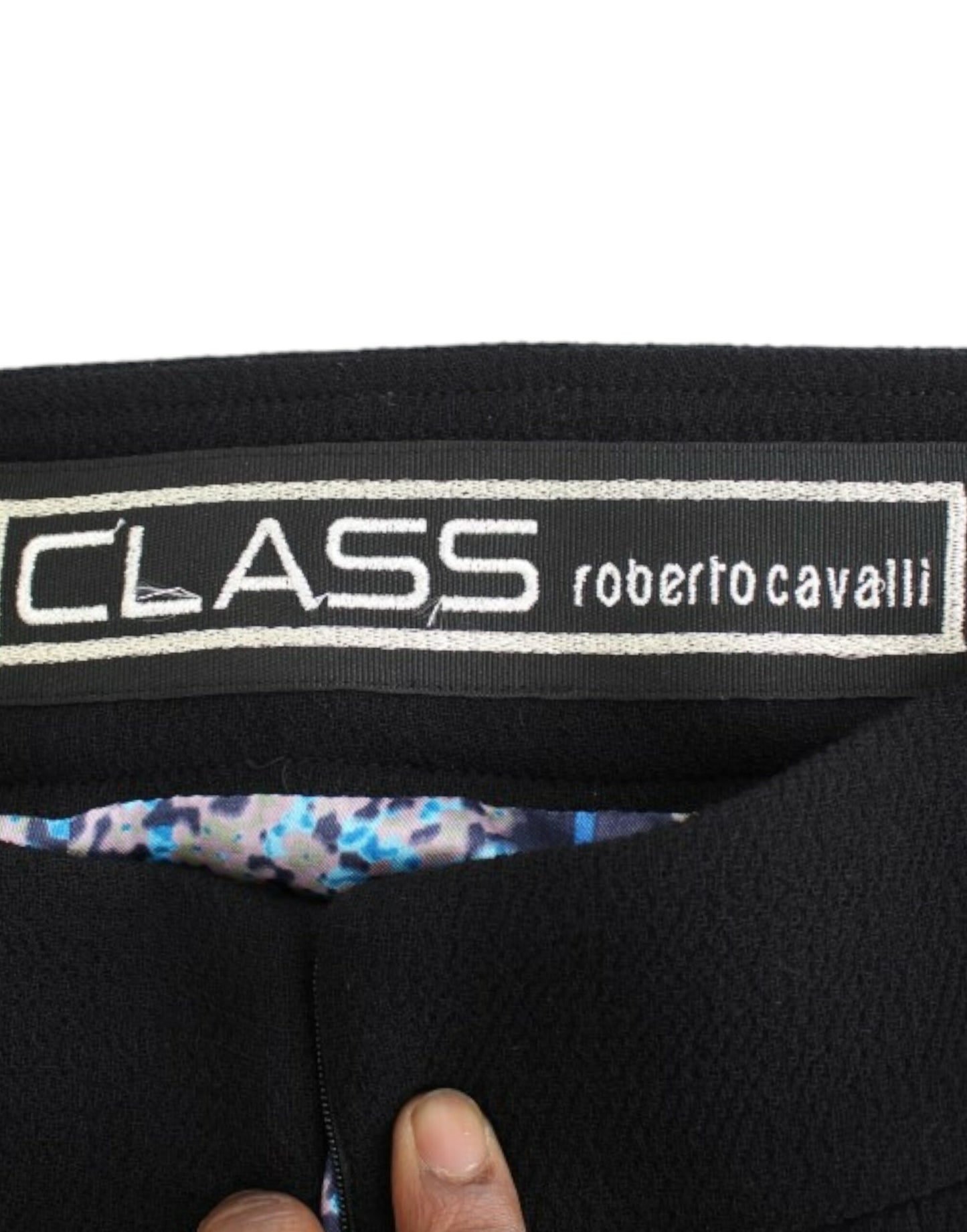Original tags and branded store bag included for authenticity
