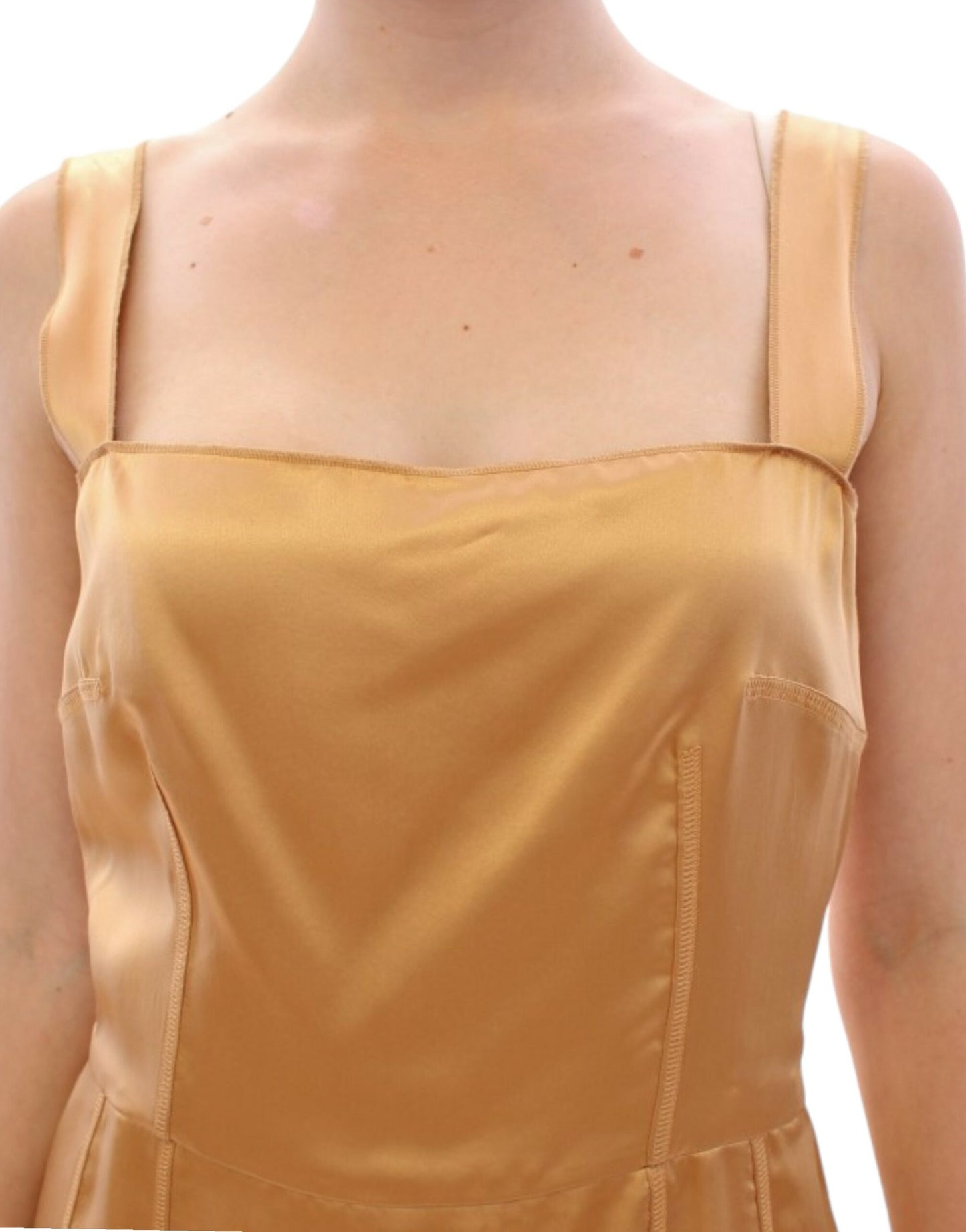 Elegant knee-length sheath silhouette with alluring back zipper