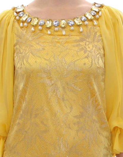 Dolce & Gabbana Yellow Lace Crystal Embellished Mini Dress in yellow color made of 62% metal, 30% silk, and 8% nylon