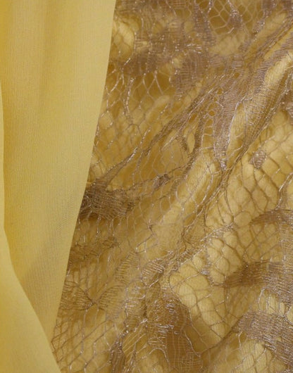 High-fashion Dolce & Gabbana Yellow Lace Crystal Embellished Mini Dress perfect for gala events, exclusive parties, and symbol of luxurious style