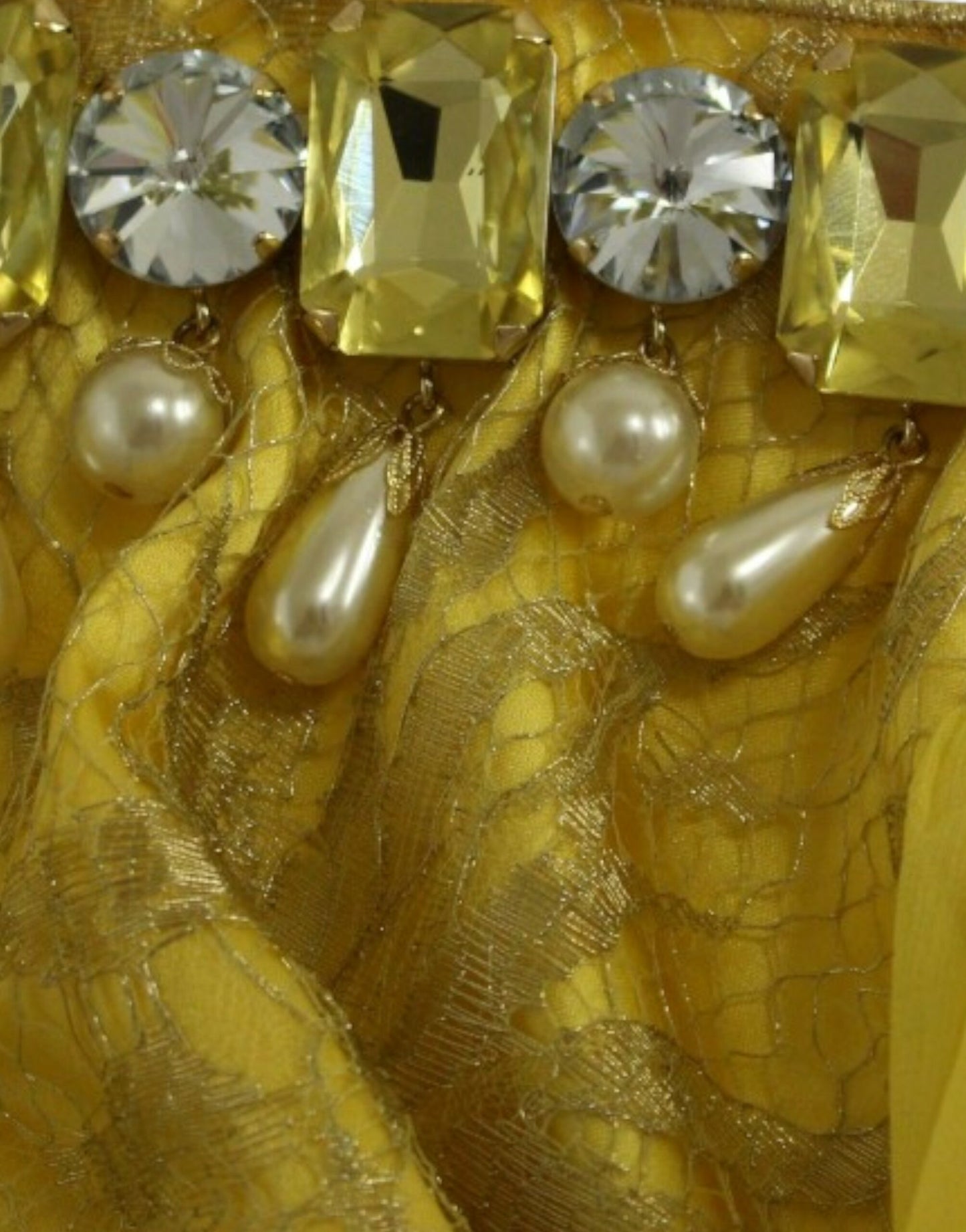 Rare and unique Dolce & Gabbana Yellow Lace Crystal Embellished Mini Dress with knee-high length and classic lace design