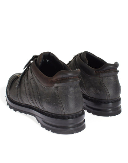 Luxurious Gray Leather Boots with Ankle Strap and High-End Designer Touch