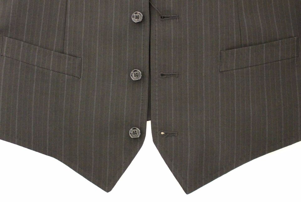 Full front button closure and subtle logo details representing luxury