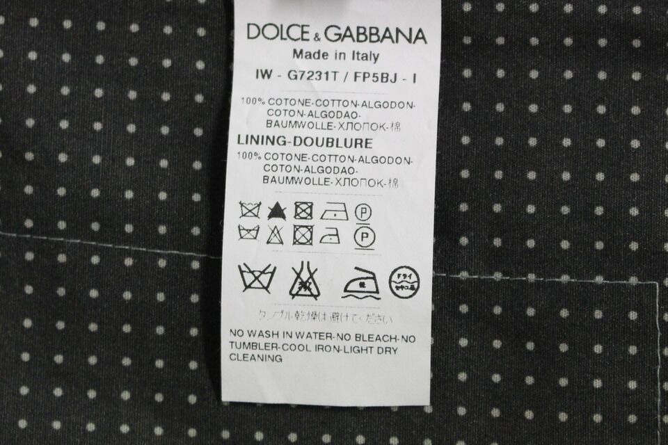 Impeccably crafted in Italy, the 100% Cotton Dolce & Gabbana Elegant Gray Dress Vest