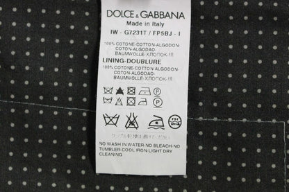 Impeccably crafted in Italy, the 100% Cotton Dolce & Gabbana Elegant Gray Dress Vest