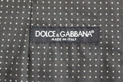 Full front button closure and subtle gray dotted pattern on Dolce & Gabbana Elegant Gray Cotton Dress Vest