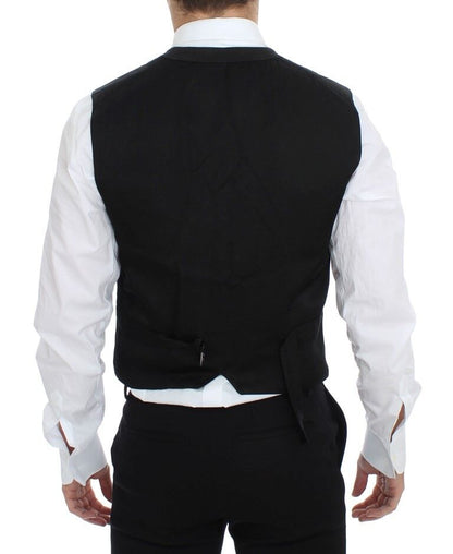 Detailed close-up of the signature logo on the black vest