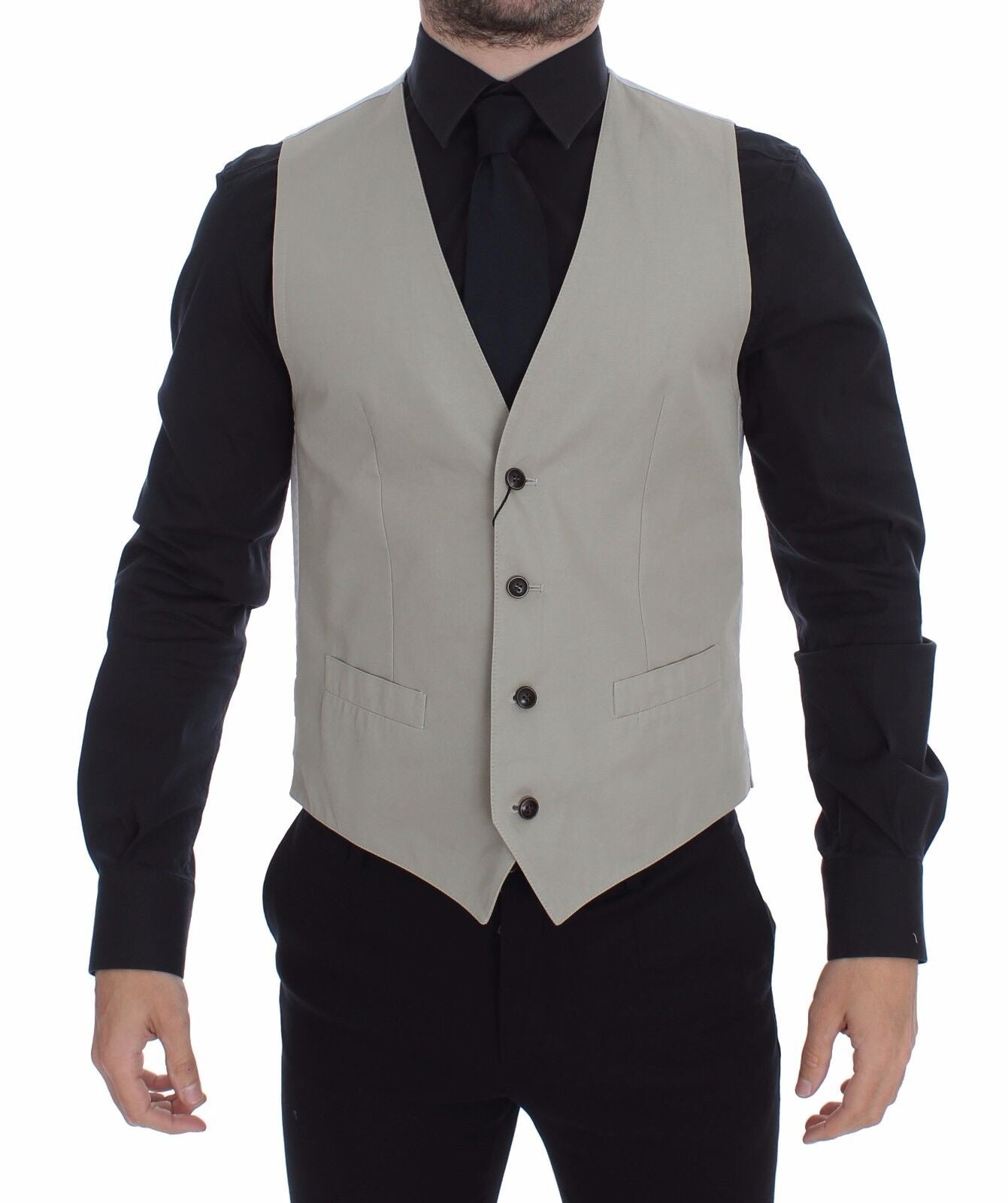 Exemplify timeless elegance with this stunning Beige Dress Vest from Dolce & Gabbana’s MainLine Collection
