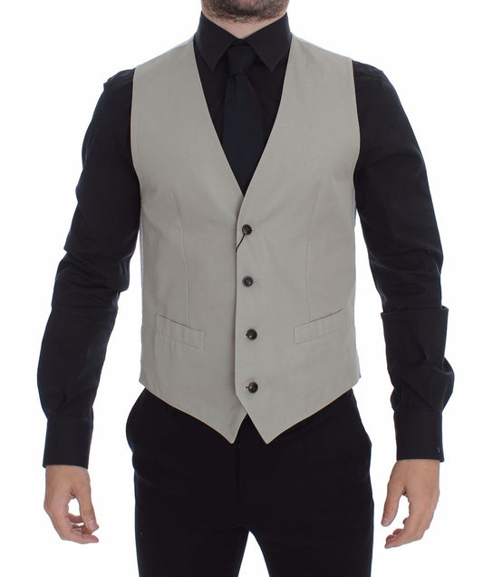 Exemplify timeless elegance with this stunning Beige Dress Vest from Dolce & Gabbana’s MainLine Collection