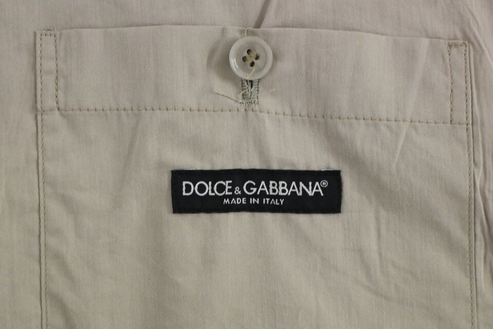  Beige 100% cotton, synonymous with Dolce & Gabbana legacy