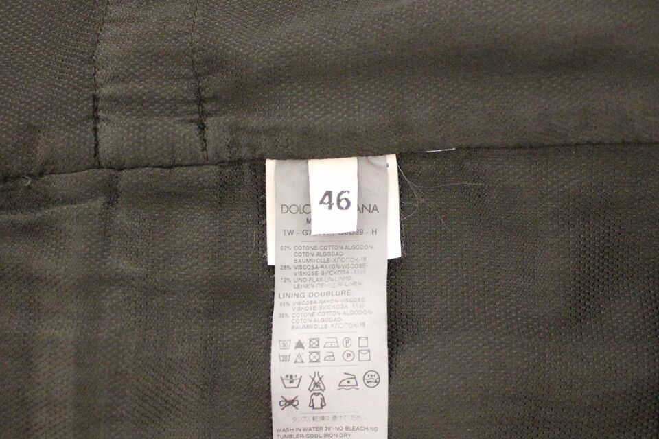 High-quality material composition of 63% Cotton, 12% Linen, 25% Viscose in Dolce & Gabbana Elegant Black Cotton Blend Dress Vest