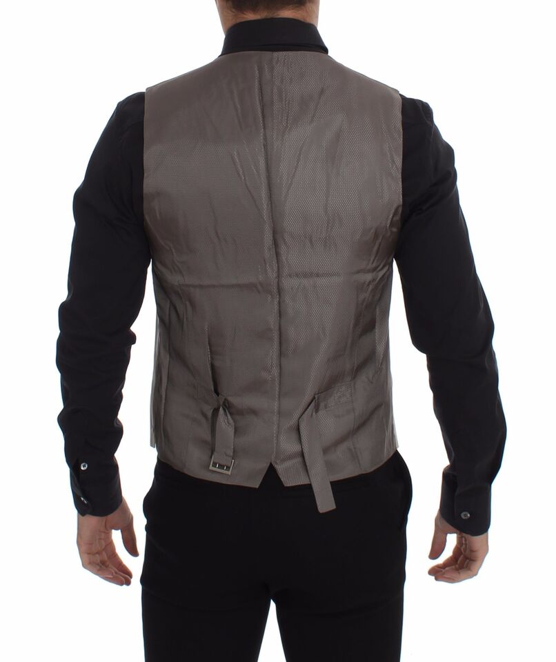 Sleek full front button closure, adorned with iconic logo