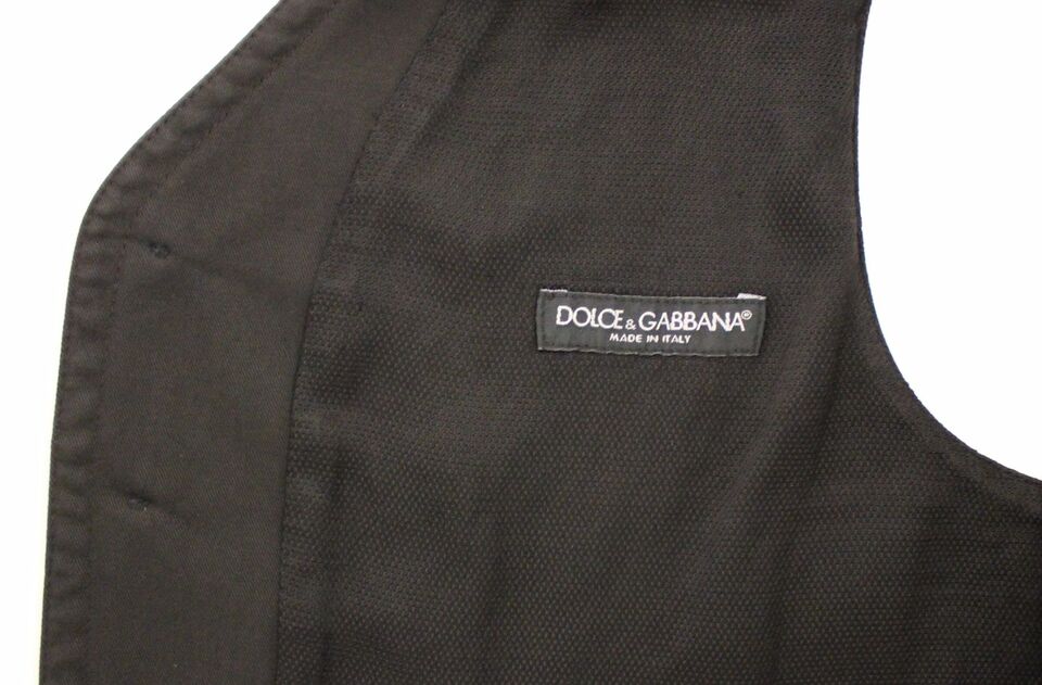 Dolce & Gabbana elegant black dress vest with button details and slim fit