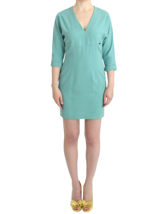 Indulge in the epitome of elegance with this stunning green midi dress from Costume National, featuring a flattering V-neck and 3/4 sleeves