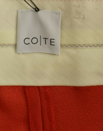 Stylish and comfortable boyfriend pants in vibrant orange, expertly crafted in Italy