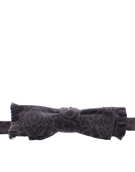 Impeccably crafted Dolce & Gabbana black paisley silk-wool blend bow tie