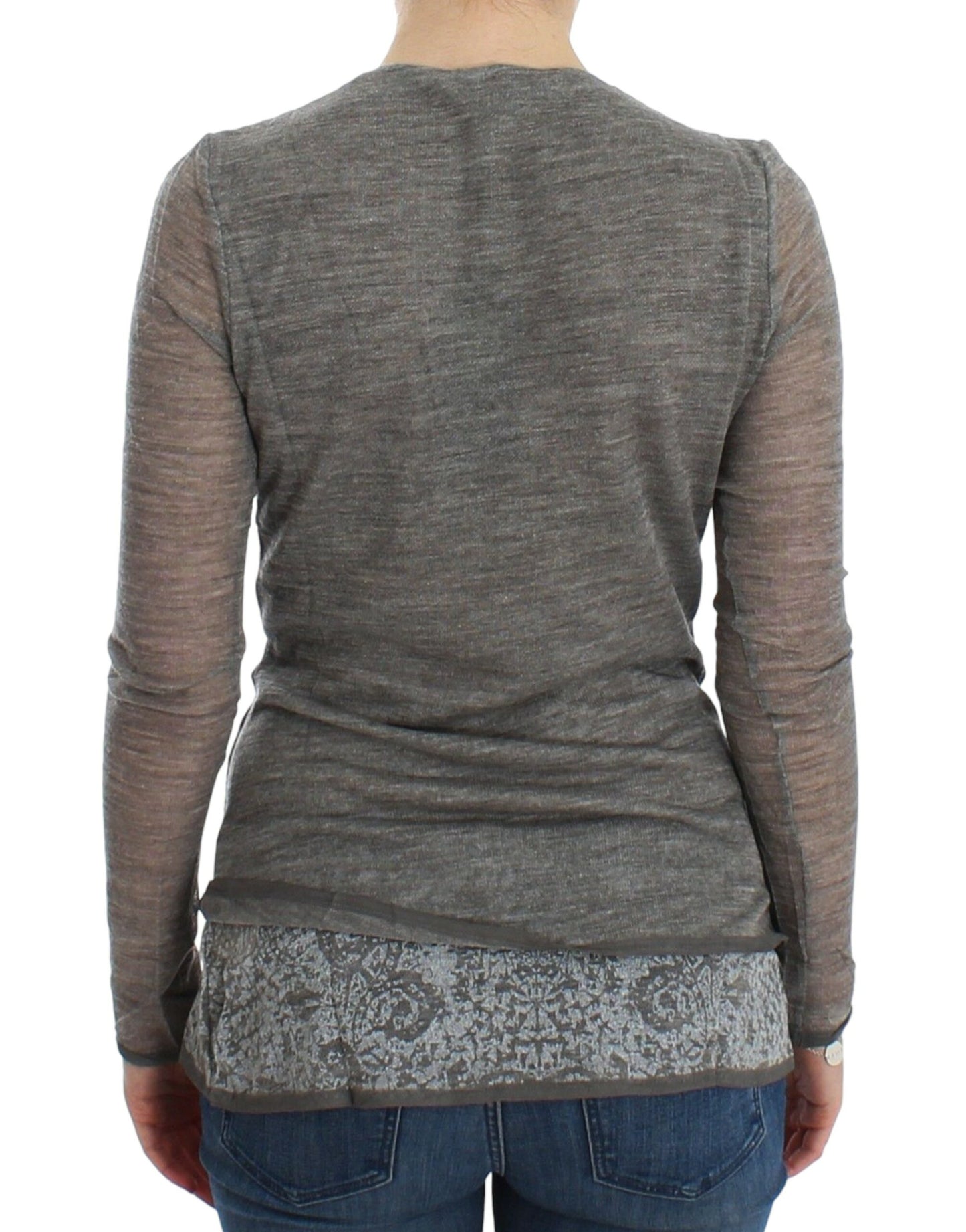 Sumptuous piece designed by Ermanno Scervino with a deep V-neck