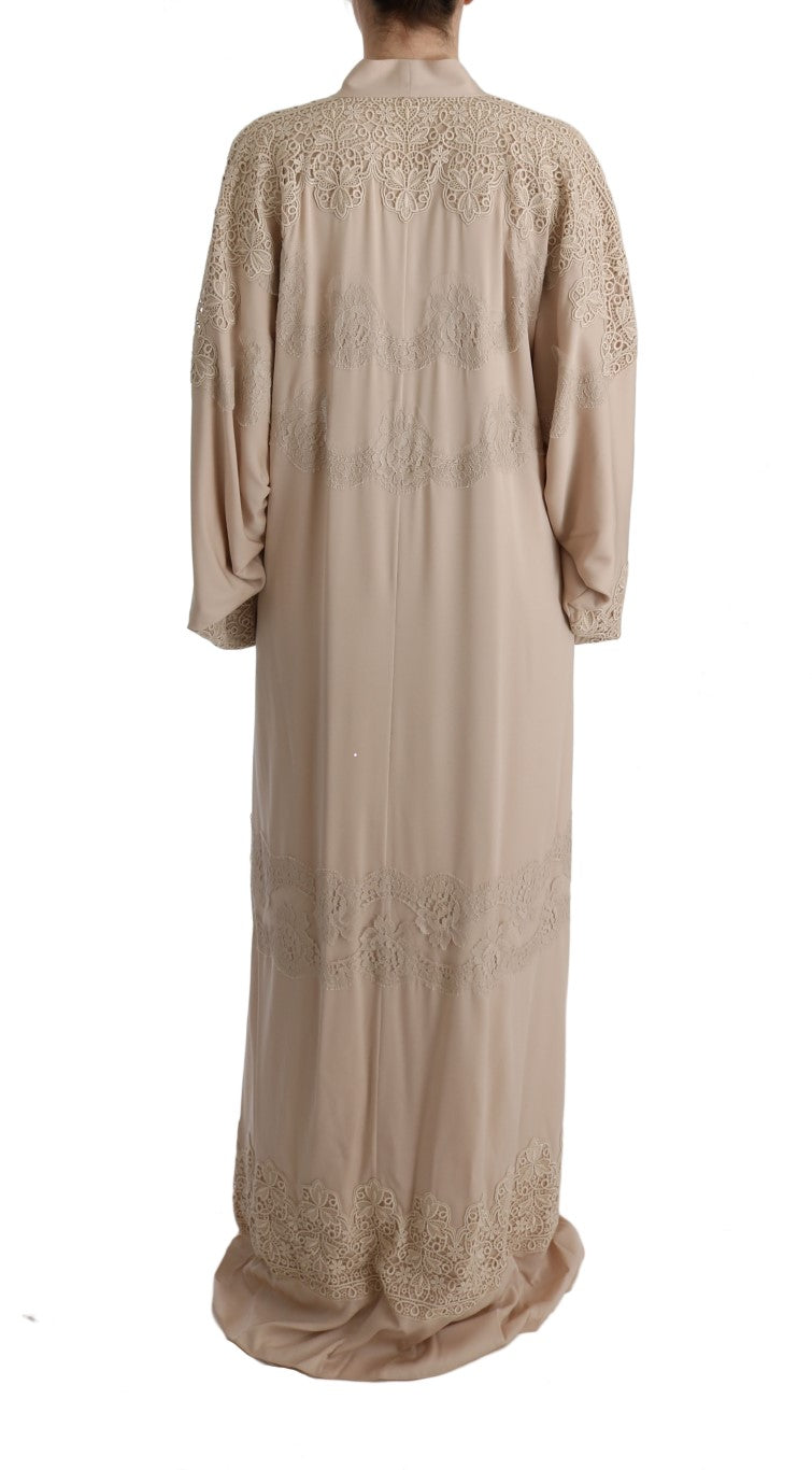 Stunning Beige Cape Kaftan Dress symbolizing high fashion and exclusivity from Dolce & Gabbana
