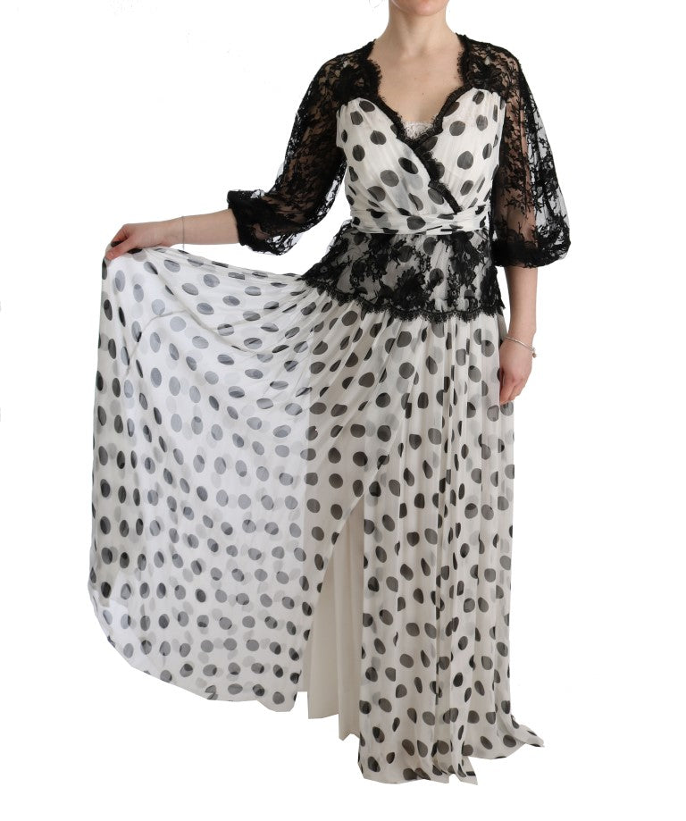 Elegant full-length gown adorned with intricate details and luxurious silk inner lining