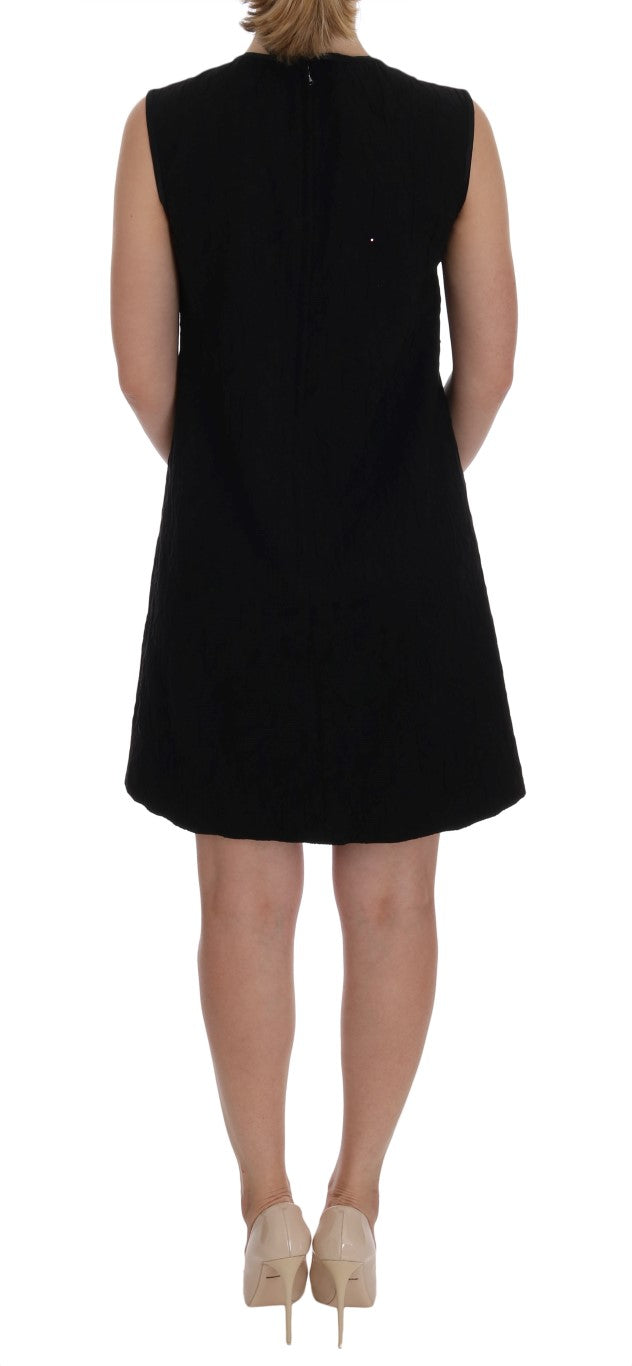 Dolce & Gabbana Black Crystal-Embellished Stretch Mini Dress side view showcasing silhouette