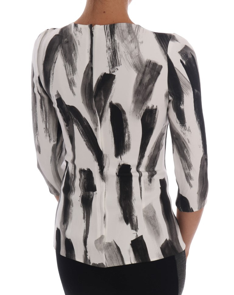 Luxury black and white blouse with discreet zipper closure from Italy