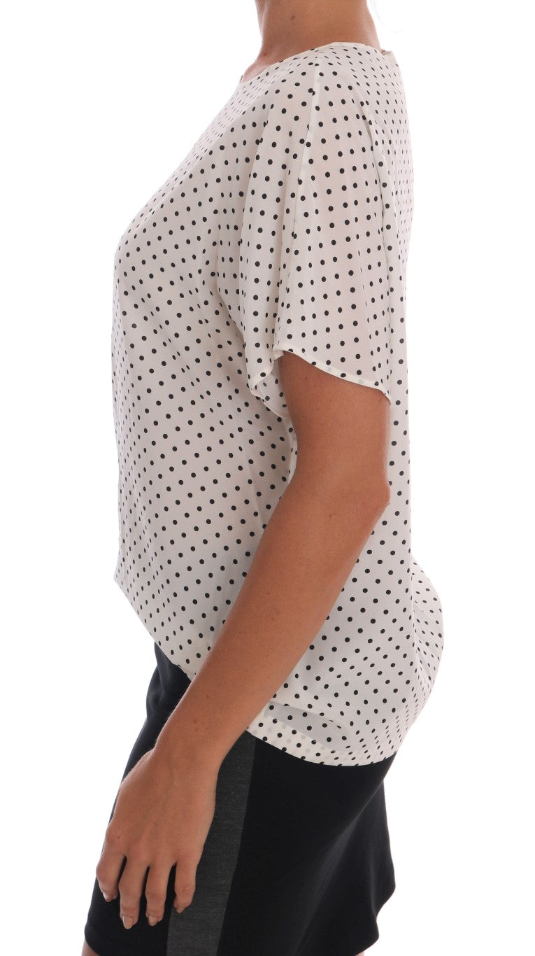 Luxurious Italian-made short-sleeve silk blouse with polka dot design