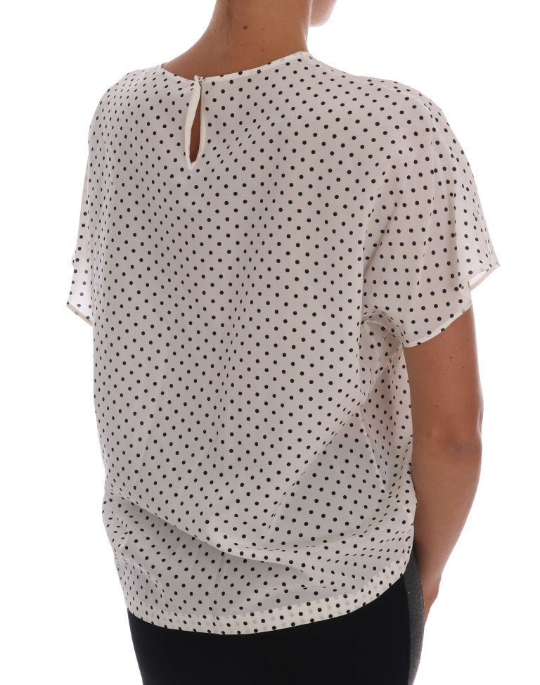 Timeless and graceful Dolce & Gabbana silk blouse in classic polka dot