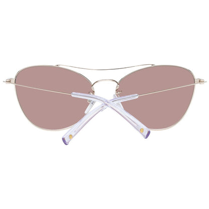 Fashionable women's sunglasses with gold frame and silver gradient lenses