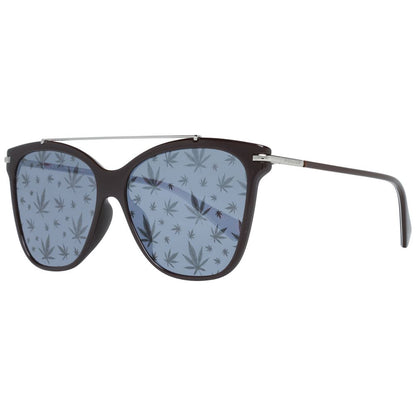 Close-up of brown women sunglasses with blue patterned lenses and butterfly style