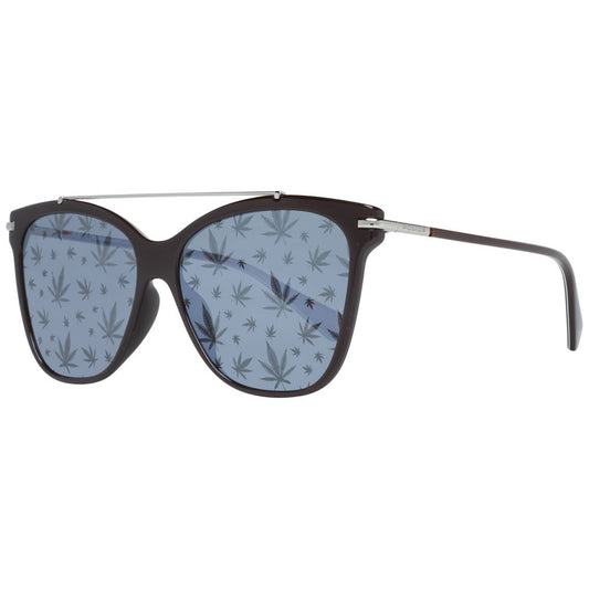 Close-up of brown women sunglasses with blue patterned lenses and butterfly style