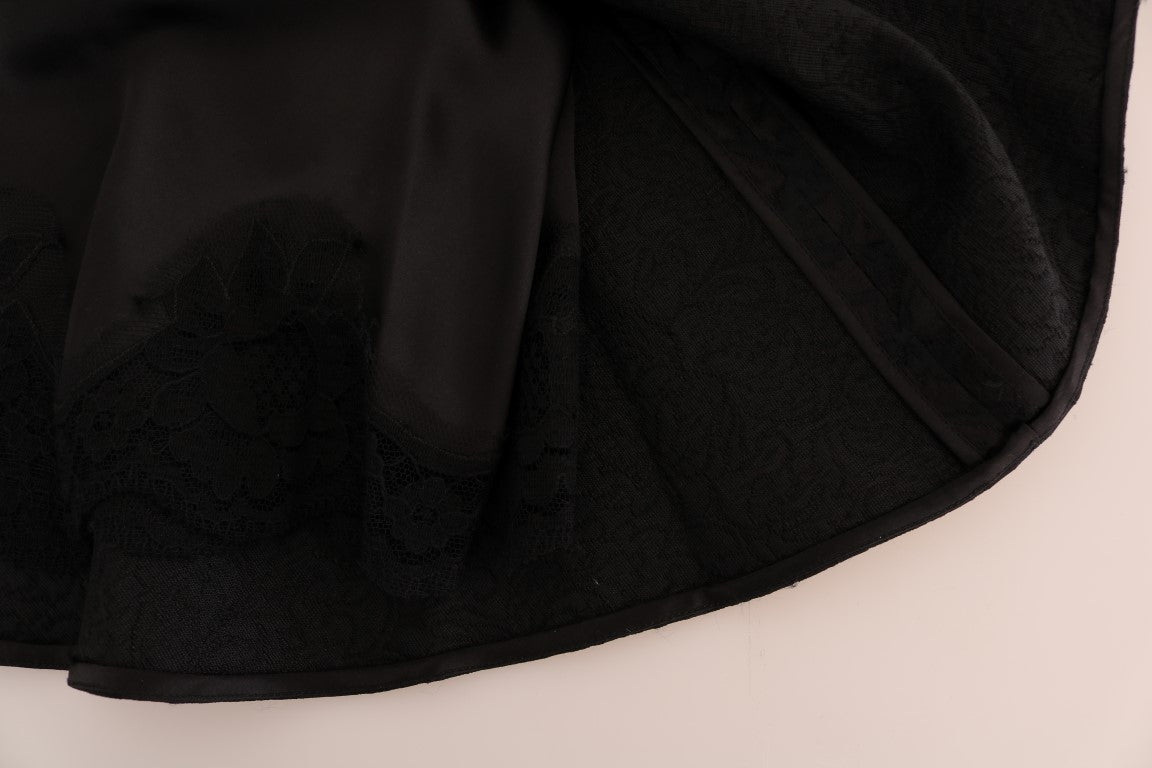 Sophisticated Dolce & Gabbana A-line mini skirt with elegant black floral jacquard pattern